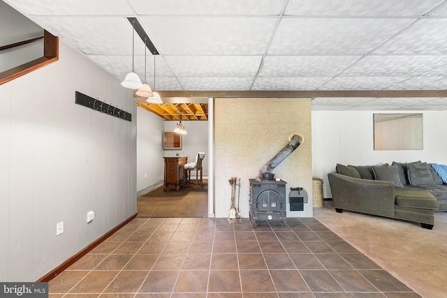 136 Main St, Red Hill, PA 18076 - living area featuring a wood stove and baseboards