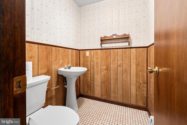 136 Main St, Red Hill, PA 18076 - half bath featuring wooden walls, a wainscoted wall, and wallpapered walls