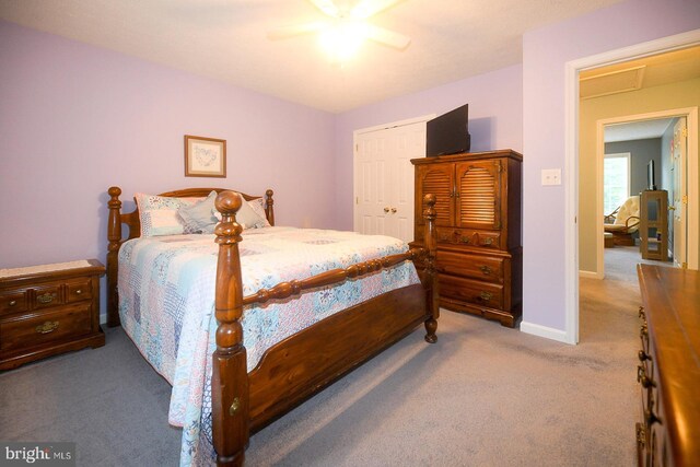 21481 Indian Bridge Rd, California, MD 20619 - carpeted bedroom with a closet and a ceiling fan