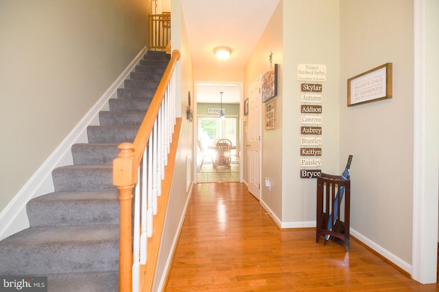 21481 Indian Bridge Rd, California, MD 20619 - stairs with hardwood / wood-style flooring