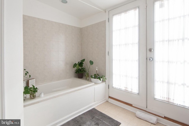 3 W 24th St W, Baltimore, MD 21218 - full bath featuring a bath, french doors, and tile patterned flooring