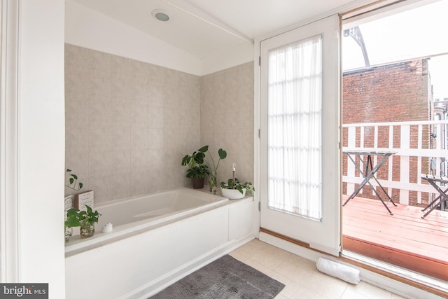 3 W 24th St W, Baltimore, MD 21218 - bathroom featuring a bath and tile patterned floors