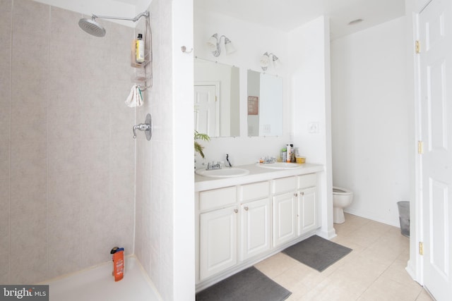 3 W 24th St W, Baltimore, MD 21218 - full bathroom featuring double vanity, tiled shower, and tile patterned floors