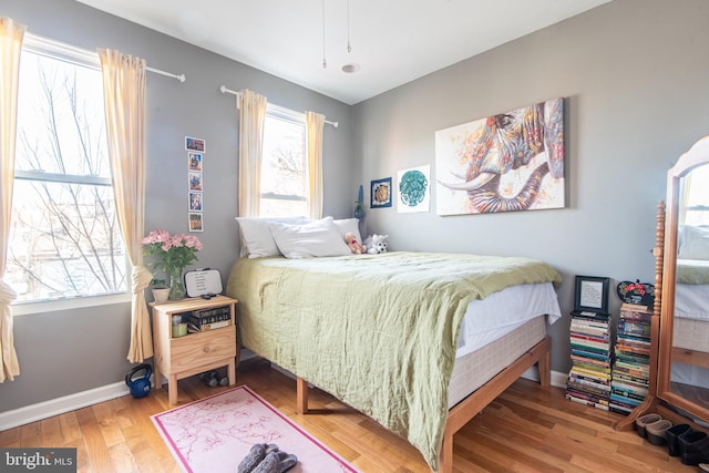 3 W 24th St W, Baltimore, MD 21218 - bedroom featuring wood finished floors and baseboards