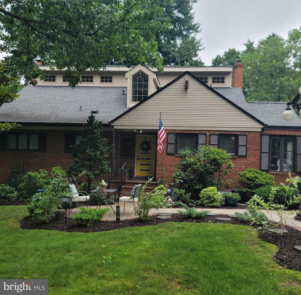 3128 Creswell Dr, Seven Corners, VA 22044 - view of front of home featuring a front lawn and brick siding