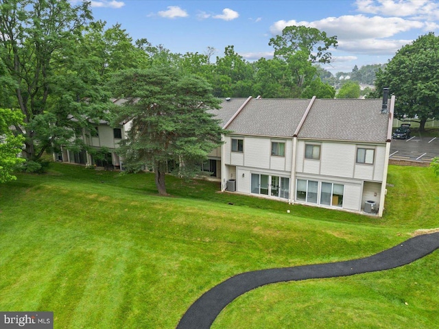 29 Twin Brooks Dr, Willow Grove, PA 19090 - view of front facade featuring a front yard and a chimney