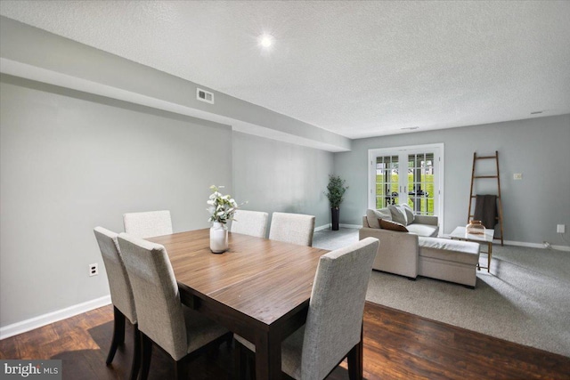 29 Twin Brooks Dr, Willow Grove, PA 19090 - dining area with french doors, a textured ceiling, and dark wood-style flooring