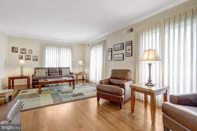500 S Lexington St, Arlington, VA 22204 - living room featuring wood finished floors and crown molding