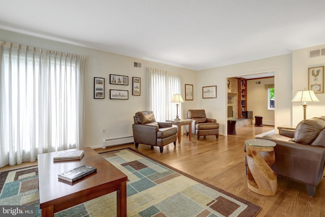 500 S Lexington St, Arlington, VA 22204 - living area with baseboard heating and wood finished floors