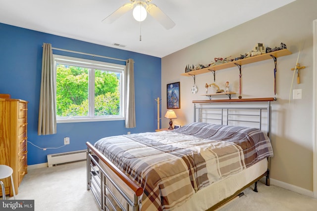500 S Lexington St, Arlington, VA 22204 - bedroom with light colored carpet, baseboard heating, and a ceiling fan