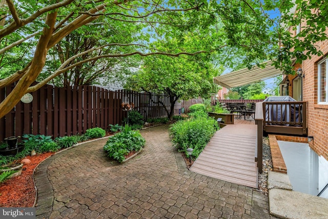 500 S Lexington St, Arlington, VA 22204 - fenced backyard with outdoor dining area, a deck, and a patio