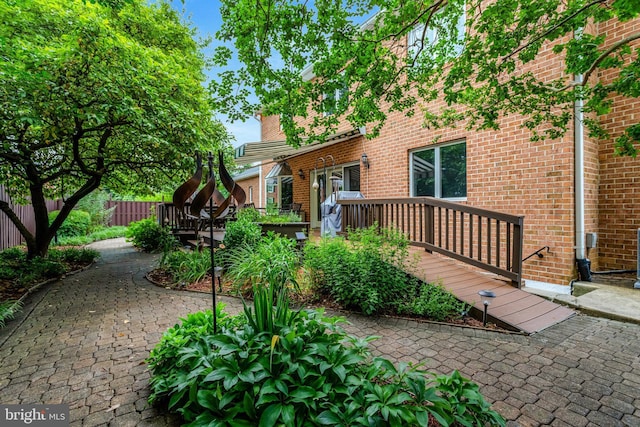500 S Lexington St, Arlington, VA 22204 - view of front of property with a wooden deck and brick siding