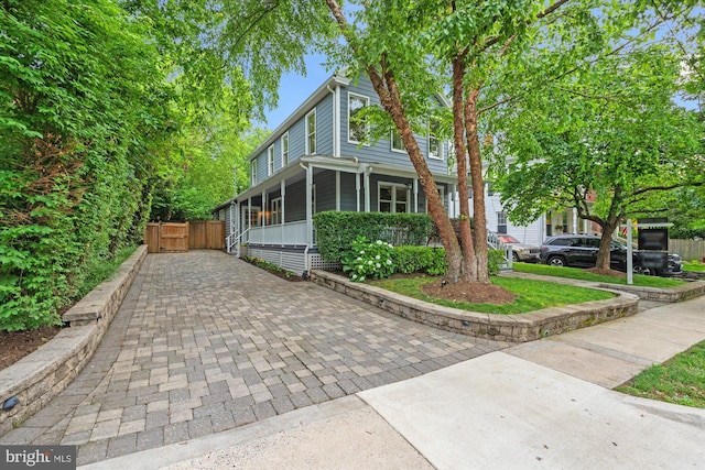 411 E Bellefonte Ave, Alexandria, VA 22301 - view of front facade featuring a gate and driveway