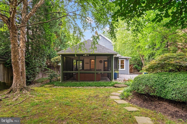 411 E Bellefonte Ave, Alexandria, VA 22301 - rear view of property featuring a sunroom