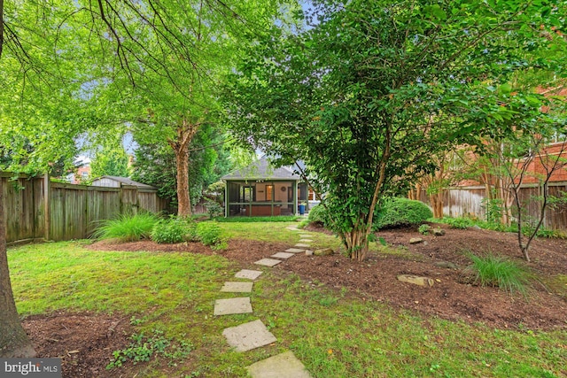 411 E Bellefonte Ave, Alexandria, VA 22301 - fenced backyard featuring a sunroom