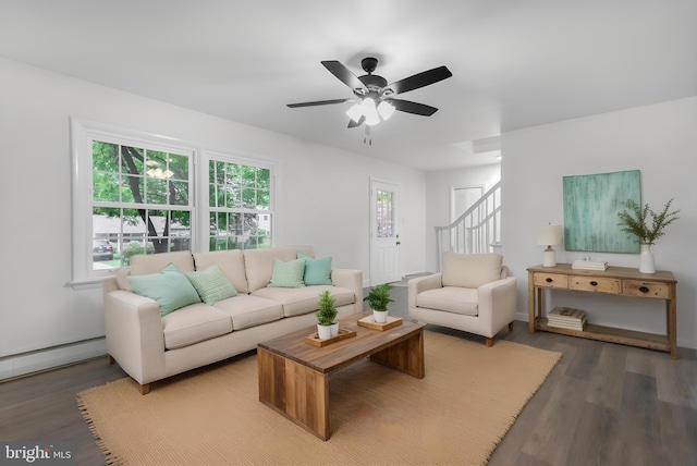 708 S Broad St, Mechanicsburg, PA 17055 - living area featuring wood finished floors, ceiling fan, and stairway