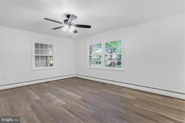 708 S Broad St, Mechanicsburg, PA 17055 - unfurnished room featuring wood finished floors, ceiling fan, and a baseboard radiator
