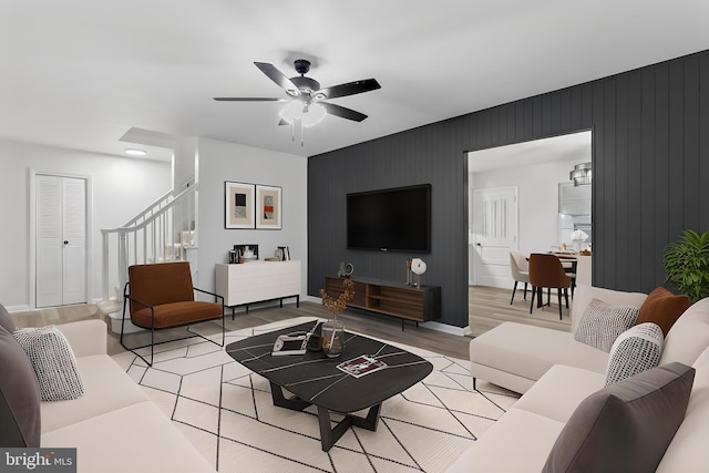 708 S Broad St, Mechanicsburg, PA 17055 - living area with a ceiling fan, stairs, and light wood-style floors