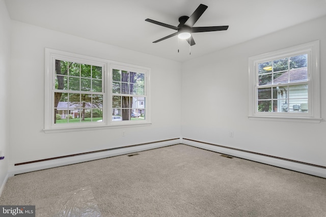 708 S Broad St, Mechanicsburg, PA 17055 - carpeted spare room featuring plenty of natural light, a ceiling fan, and baseboard heating