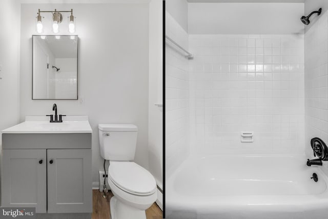 708 S Broad St, Mechanicsburg, PA 17055 - full bath featuring vanity, bathtub / shower combination, and wood finished floors