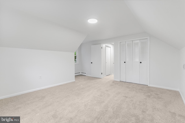 708 S Broad St, Mechanicsburg, PA 17055 - bonus room with baseboard heating, vaulted ceiling, and light colored carpet