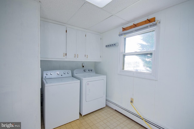 121 E James St, Winchester, VA 22601 - laundry room with baseboard heating, washer and dryer, light floors, and cabinet space
