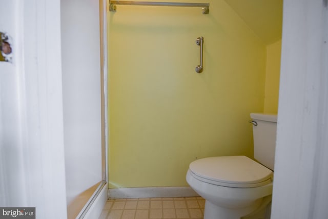 121 E James St, Winchester, VA 22601 - bathroom featuring tile patterned floors and vaulted ceiling