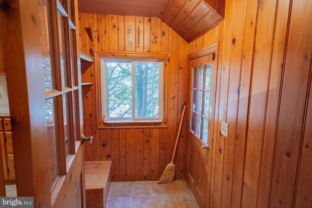 121 E James St, Winchester, VA 22601 - doorway to outside with vaulted ceiling and wood walls