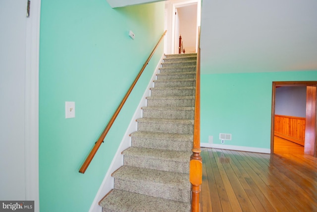 121 E James St, Winchester, VA 22601 - stairway featuring wood-type flooring and baseboards