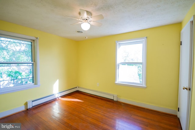 121 E James St, Winchester, VA 22601 - spare room with healthy amount of natural light, hardwood / wood-style flooring, ceiling fan, and a textured ceiling