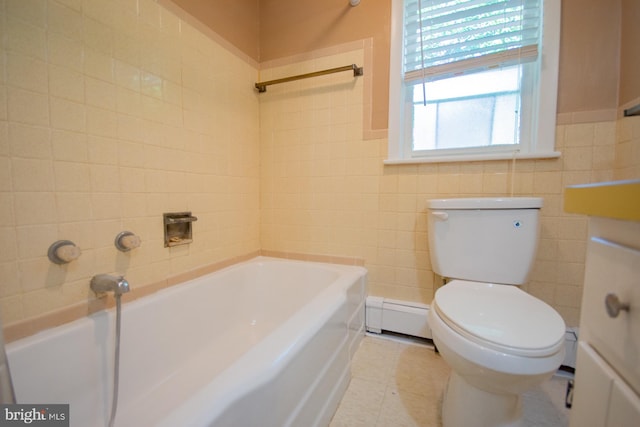 121 E James St, Winchester, VA 22601 - full bath with baseboard heating, a tub to relax in, tile patterned flooring, and tile walls