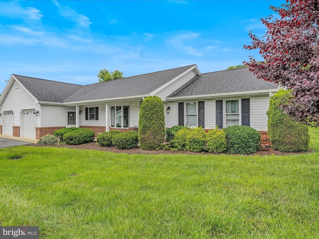 23 Garden Dr, Berkeley Springs, WV 25411 - ranch-style home with brick siding, an attached garage, roof with shingles, and a front yard