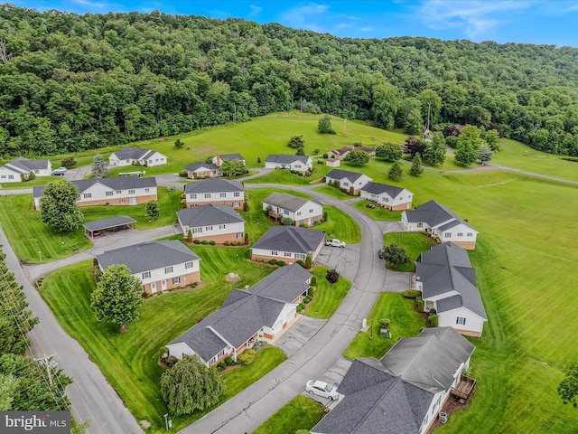 23 Garden Dr, Berkeley Springs, WV 25411 - aerial view of residential area featuring a forest