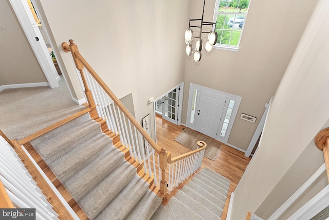 36453 Dwyer Ct, Round Hill, VA 20141 - entrance foyer featuring a towering ceiling and wood finished floors
