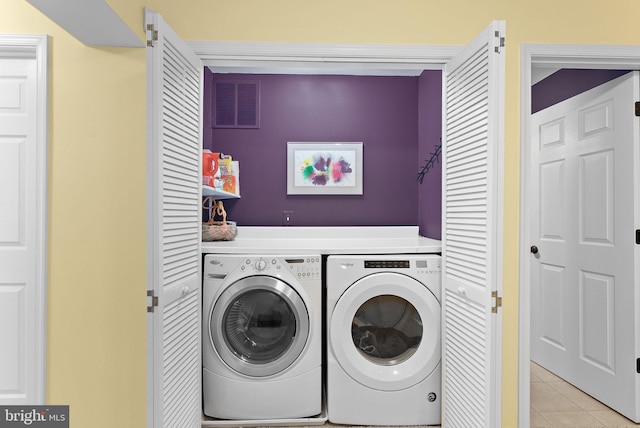 36453 Dwyer Ct, Round Hill, VA 20141 - laundry room featuring washer and dryer and light tile patterned flooring