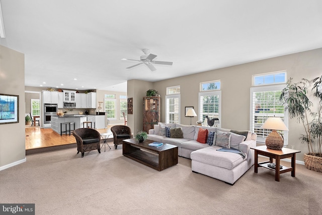 36453 Dwyer Ct, Round Hill, VA 20141 - living area with light carpet, healthy amount of natural light, ceiling fan, and recessed lighting
