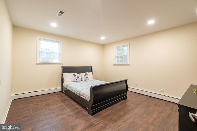 1363 Byberry Rd, Huntingdon Valley, PA 19006 - bedroom with baseboard heating, wood finished floors, and recessed lighting