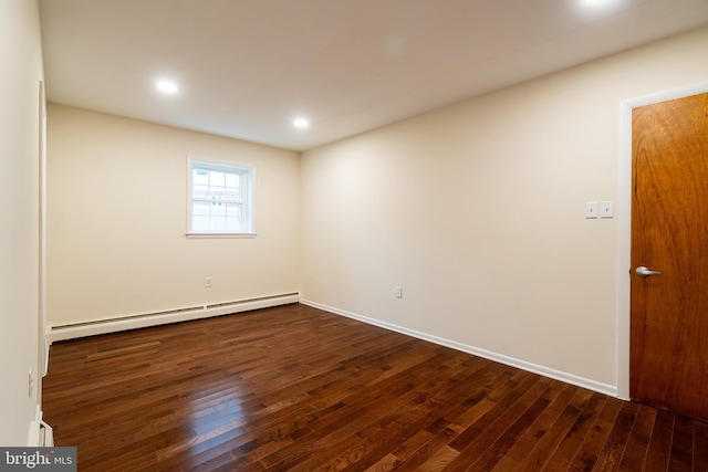 1363 Byberry Rd, Huntingdon Valley, PA 19006 - spare room featuring a baseboard heating unit, dark wood-style flooring, and recessed lighting