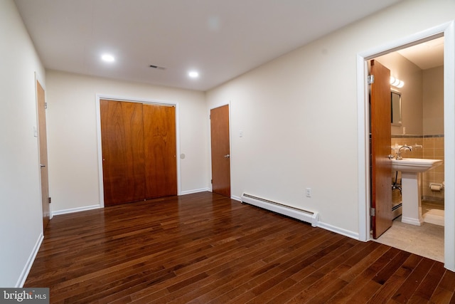 1363 Byberry Rd, Huntingdon Valley, PA 19006 - unfurnished bedroom featuring a baseboard heating unit, hardwood / wood-style floors, a closet, recessed lighting, and ensuite bath