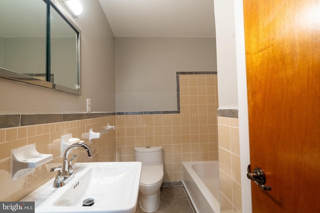 1363 Byberry Rd, Huntingdon Valley, PA 19006 - full bathroom featuring a tub to relax in, tile walls, tile patterned flooring, and wainscoting