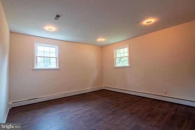 1363 Byberry Rd, Huntingdon Valley, PA 19006 - empty room featuring baseboard heating and dark wood-style floors