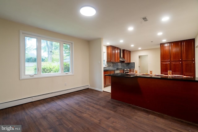 1363 Byberry Rd, Huntingdon Valley, PA 19006 - kitchen with a baseboard radiator, dark countertops, dark wood-type flooring, tasteful backsplash, and recessed lighting