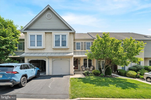 1305 Halifax Ct Unit 1305, West Chester, PA 19382 - townhome / multi-family property featuring driveway, a front lawn, a shingled roof, a garage, and a standing seam roof