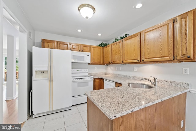 1305 Halifax Ct Unit 1305, West Chester, PA 19382 - kitchen with white appliances, a peninsula, light stone countertops, light tile patterned floors, and recessed lighting