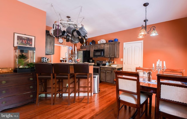 34 N Erin Ave, Felton, DE 19943 - dining room with a chandelier and light wood-type flooring