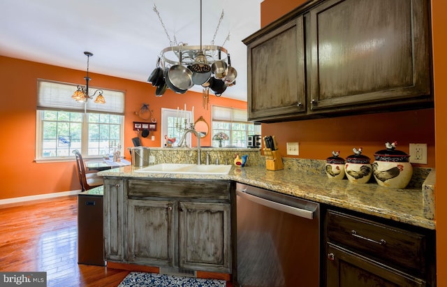 34 N Erin Ave, Felton, DE 19943 - kitchen featuring stainless steel dishwasher, a peninsula, a chandelier, light wood-style flooring, and dark brown cabinetry