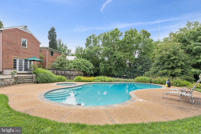 3917 Fessenden St NW, Washington, DC 20016 - view of swimming pool with a patio area, an in-ground hot tub, and a wooden deck