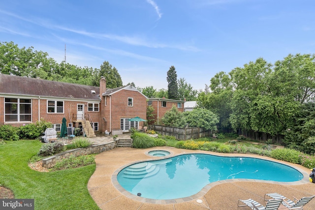 3917 Fessenden St NW, Washington, DC 20016 - view of pool with a patio area, an in-ground hot tub, and a fenced backyard