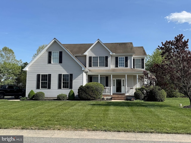 334 Ashland Ave, Camden Wyoming, DE 19934 - view of front facade featuring a porch and a front yard