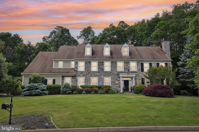 10 Callery Way, Malvern, PA 19355 - view of front of house with a yard, stone siding, and a chimney